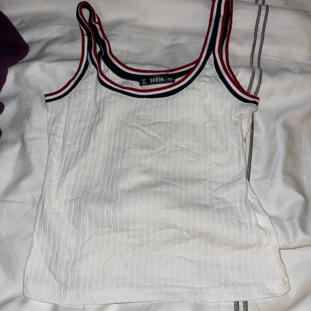 White tank top with red and blue lining